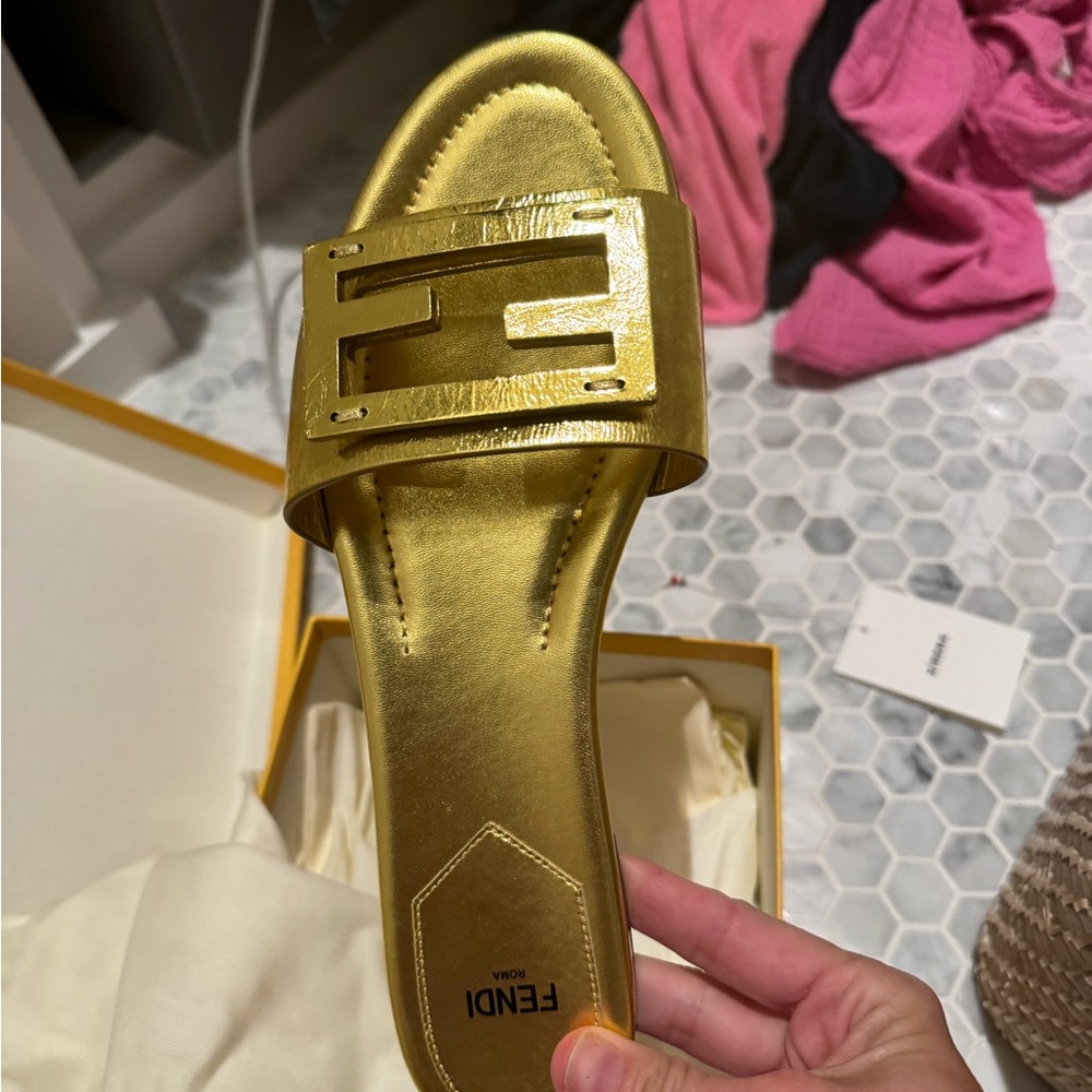 Fendi gold metallic slides